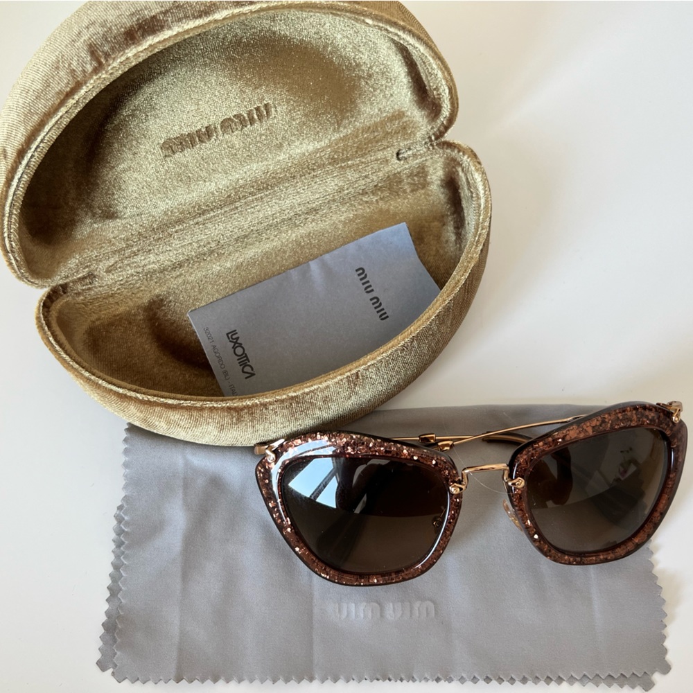 Miu Miu noir glitter cat eye sunnies in bronze/gold